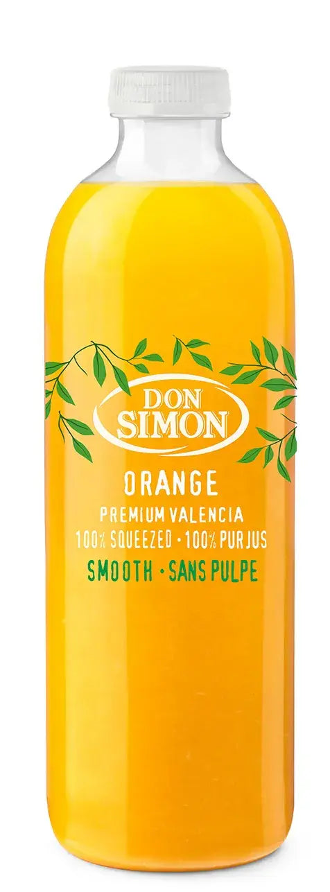 A bottle of Don Simon Orange Premium Valencia juice, featuring a bright orange liquid inside a clear plastic bottle with a white cap and a green and white label.