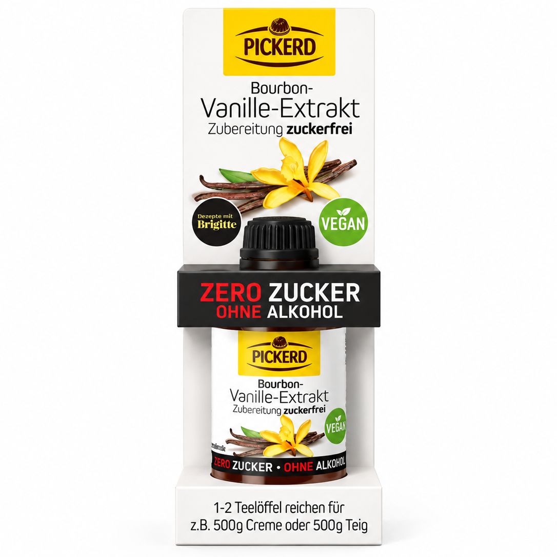 A bottle of Pickerd Bourbon-Vanille-Extrakt with its retail packaging, featuring vanilla bean illustrations and text indicating zero sugar and zero alcohol.